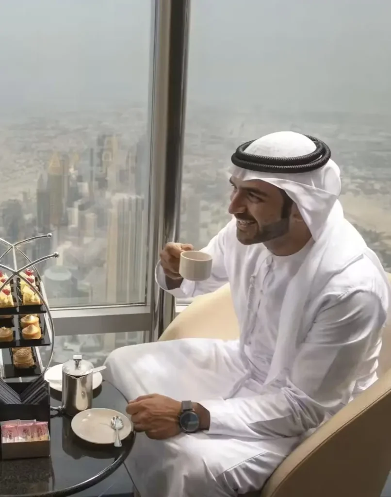 a man drinking coffee at the lounge burj khalifa